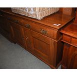 LATE 19TH/ EARLY 20TH CENTURY WALNUT SIDEBOARD WITH TWO FRIEZE DRAWERS AND TWO CUPBOARD DOORS BELOW