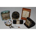 A COLLECTION OF TRAVELLING CLOCKS TO INCLUDE WALKER AND HALL 8 DAY TRAVELLING CLOCK, ROAMER