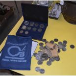 A COLLECTION OF ASSORTED VINTAGE CROWNS CONTAINED WITHIN MONEY BAG AND BLUE RECTANGULAR BOX