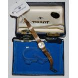 A VINTAGE 9CT GOLD CASED LADIES TISSOT WRISTWATCH WITH 9CT GOLD STRAP, GROSS WEIGHT 17.2GRAMS,