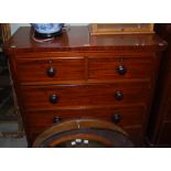 A VICTORIAN MAHOGANY CHEST OF TWO SHORT OVER THREE LONG GRADUATED DRAWERS