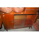 MID-CENTURY OAK BOOKCASE WITH SINGLE CUPBOARD DOOR, GLASS SLIDING DOORS AND ADJUSTABLE SHELVES