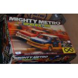 A VINTAGE MIGHTY METRO SCALEXTRIX SLOT RACING TOY IN ORIGINAL BOX