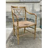 *COUNTRY HOUSE REGENCY PAINTED AND SIMULATED BAMBOO ELBOW CHAIR, WITH WOVEN RUSH SEAT