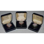 THREE BOXED BIRMINGHAM SILVER MOUNTED WEDGWOOD JASPER WARE CIRCULAR BOXES AND COVERS