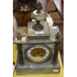 A LATE 19TH / EARLY 20TH ONYX MANTLE CLOCK, OF SQUARE ARCHITECTURAL FORM WITH BRASS MOUNTS, THE GILT