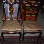 PAIR OF ART NOUVEAU MAHOGANY, MARQUETRY AND MOTHER OF PEARL INLAID SIDE CHAIRS, THE SOLID SPLATS