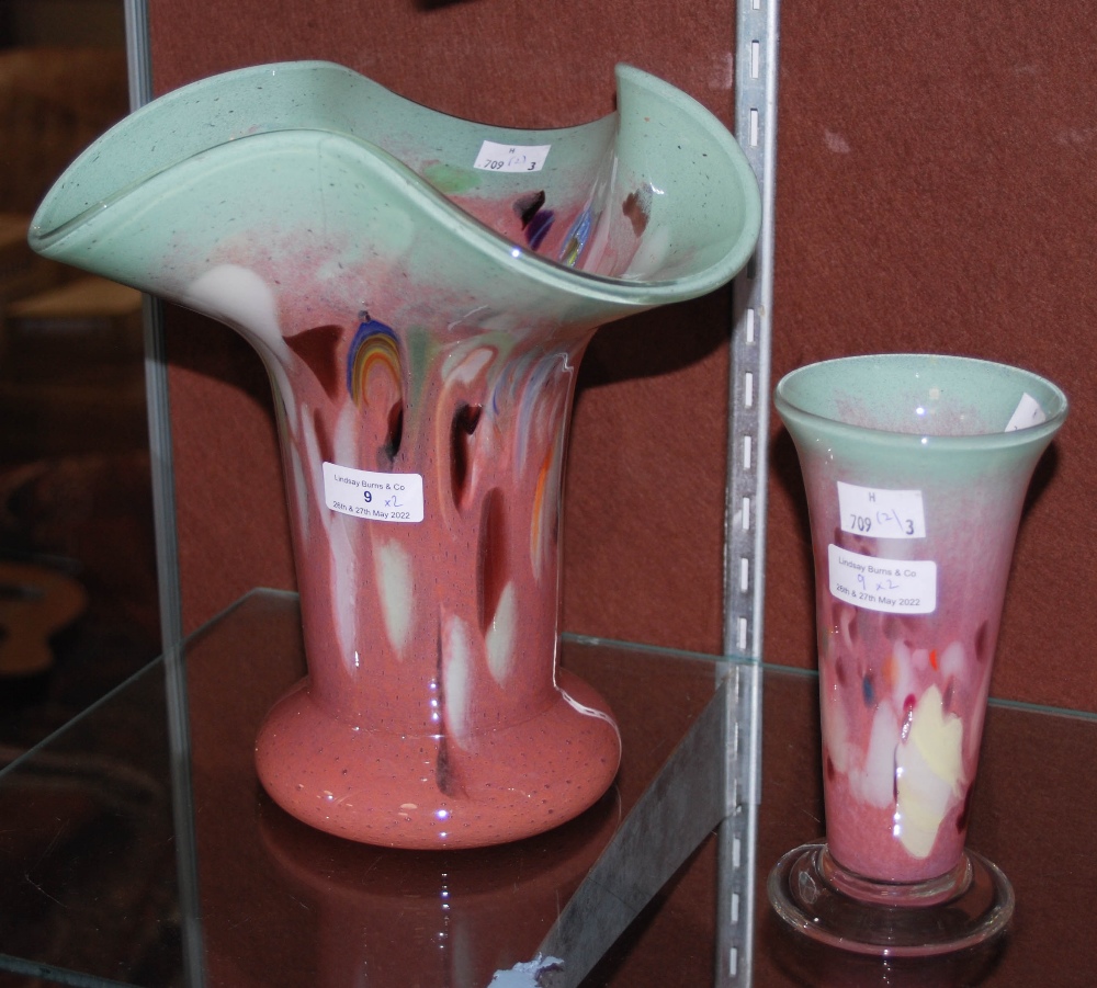 A VASART GLASS VASE MOTTLED GREEN AND PINK TOGETHER WITH ANOTHER SIMILAR COLOURED VASART VASE ON