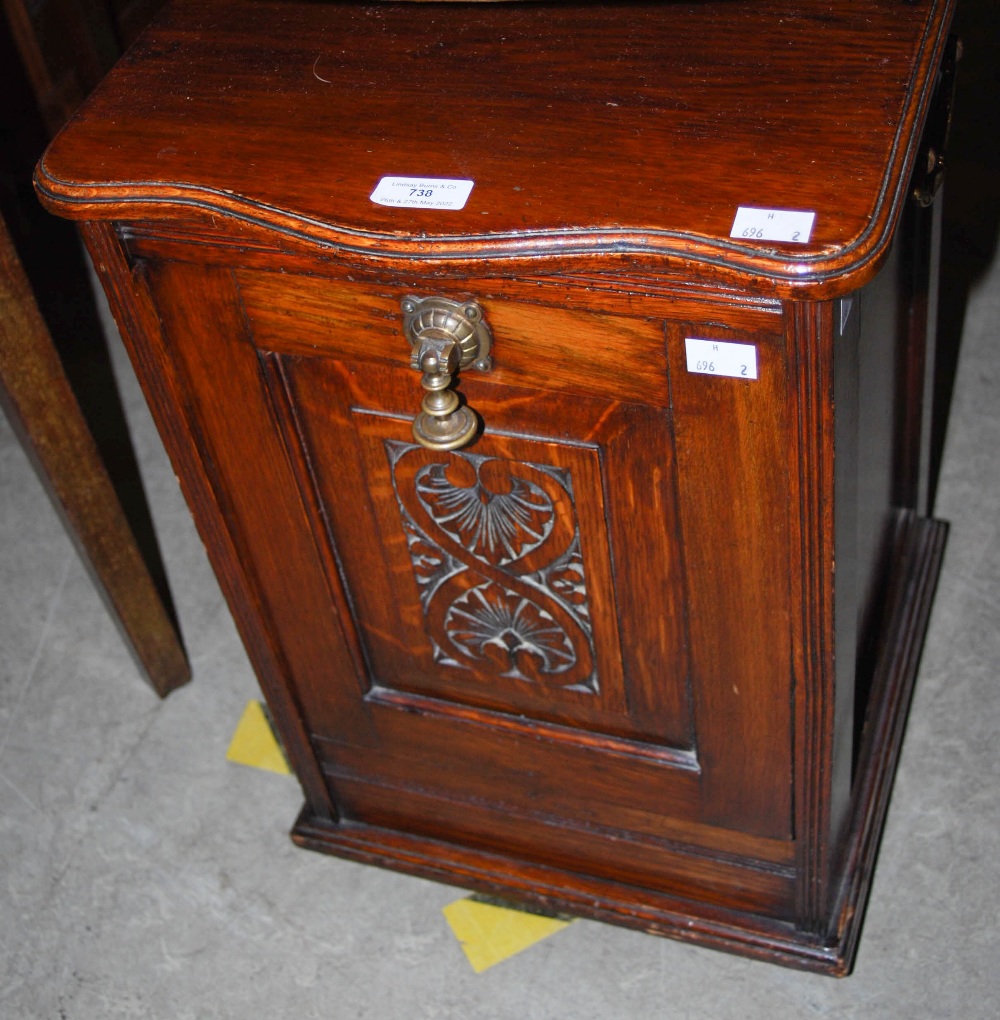 LATE VICTORIAN OAK FUEL BIN WITH HINGED FALL-FRONT AND SHELL CARVED DETAIL
