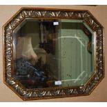 A 20TH CENTURY MAHOGANY OVAL WALL MIRROR TOGETHER WITH A SMALLER SQUARE GILT COMPOSITE FRAMED WALL