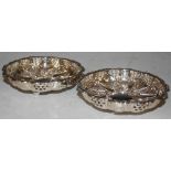 A PAIR OF BIRMINGHAM SILVER BON BON DISHES WITH EMBOSSED SCROLL AND PIERCED DETAIL, CIRCULAR FORM ON