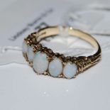 A VINTAGE 9CT GOLD AND FIVE STONE OPAL RING, SIZE Q