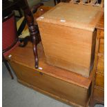 A PINE KIST, TOGETHER WITH AN OAK RECTANGULAR LAUNDRY BIN WITH HINGED COVER.