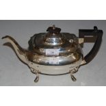 A SHEFFIELD SILVER TEA POT, MAKERS MARK WALKER & HALL, OVAL SHAPED ON FOUR SHAPED SUPPORTS