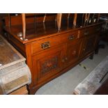 LATE 19TH/ EARLY 20TH CENTURY STAINED OAK SIDEBOARD FITTED WITH TWO FRIEZE DRAWERS AND THREE