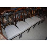 VICTORIAN EBONISED PARLOUR SUITE COMPRISING FOUR UPHOLSTERED SIDE CHAIRS AND TWO SIMILAR SMALLER