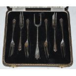 A CASED SET OF SIX BIRMINGHAM SILVER PASTRY FORKS AND SERVING FORK