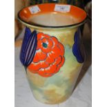 AN ART DECO WILKINSON & CO POTTERY VASE DECORATED WITH STYLISED FLOWERS, COVERED IN A LUSTRE GLAZE