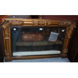 A 19TH CENTURY GILT WOOD OVER MANTEL, THE FRAME WITH HALF-COLUMN AND FOLIATE CARVED DETAIL