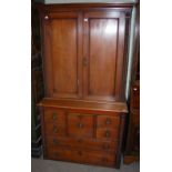 A 19TH CENTURY MAHOGANY TWO PART CUPBOARD, THE UPPER SECTION WITH PAIR OF RECTANGULAR PANEL DOORS