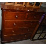 A VICTORIAN MAHOGANY CHEST OF TWO SHORT OVER THREE LONG GRADUATED DRAWERS