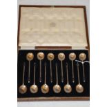 A CASED SET OF TWELVE SHEFFIELD SILVER COFFEE SPOONS WITH BEAN TERMINALS