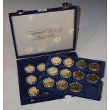 A CASED SET OF TWENTY THREE GILT METAL COMMEMORATIVE TEN DOLLAR COINS, LEGENDARY AIRCRAFT