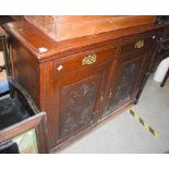 LATE VICTORIAN OAK DRESSER BASE FITTED WITH TWO DRAWERS AND TWO CUPBOARD DOORS.