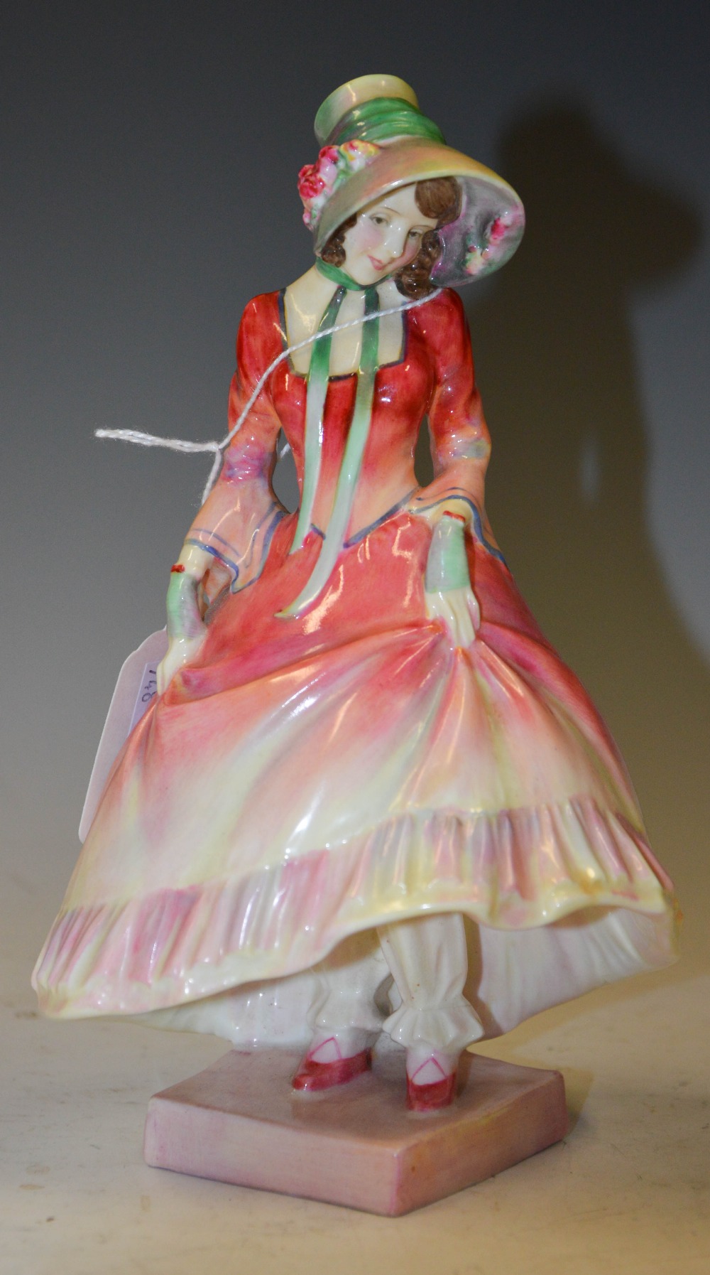 AN EARLY 20TH CENTURY ROYAL DOULTON 'PANTALETTES' LADY FIGURE, HN1507, HANDPAINTED THROUGHOUT IN