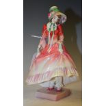 AN EARLY 20TH CENTURY ROYAL DOULTON 'PANTALETTES' LADY FIGURE, HN1507, HANDPAINTED THROUGHOUT IN