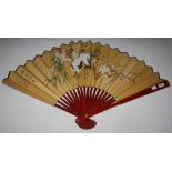 A LARGE CHINESE PAINTED SILK FAN, DECORATED WITH RED CAP MANCHURIAN CRANES AND BLOSSOM, END STICKS