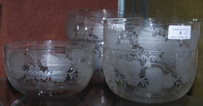 FIVE LATE 19TH / EARLY 20TH CENTURY CLEAR GLASS FINGER BOWLS WITH VINE ETCHED DECORATION