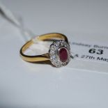 A 20TH CENTURY RUBY AND DIAMOND CLUSTER DRESS RING, A WHITE METAL SETTING ON A YELLOW METAL BAND,