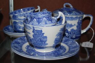 AN EARLY 20TH CENTURY CAULDON BLUE PRINTED TEA SET FOR TWO, COMPRISING TEA POT, SUGAR AND CREAM, TWO