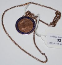A 9CT GOLD AND BLUE ENAMEL MEDAL INSCRIBED 'THE AUSTRALIAN REFEREE NEWSPAPER CHAMPION CUP' SUSPENDED