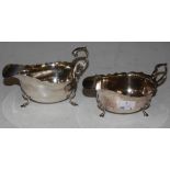 A CHESTER SILVER SAUCE BOAT TOGETHER WITH A BIRMINGHAM SILVER SAUCE BOAT, 7.7 TROY OZS.