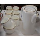 A WEDGWOOD WHITE AND GILT COFFEE SET