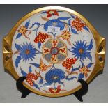 A HUTSCHENREUTHER IMARI PATTERN TWIN HANDLED PLATE