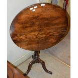 A 19TH CENTURY PINE SNAP TOP CIRCULAR OCCASIONAL TABLE