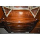 A 20TH CENTURY MAHOGANY BOWFRONT CHEST OF FOUR DRAWERS