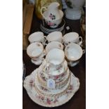 A ROYAL ALBERT LAVENDER ROSE PATTERN PART TEA SET TOGETHER WITH A QUEEN ANNE ROSE DECORATED PART TEA