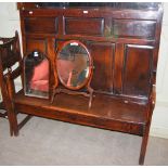 LATE 18TH/ 19TH CENTURY OAK HALL SETTLE WITH PANELLED BACK, SOLID SEAT ON SQUARE SECTION SUPPORTS.
