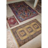 THREE ASSORTED RUGS TO INCLUDE PERSIAN RUG WITH RECTANGULAR FIELD DECORATED WITH THREE STYLISED