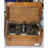 AN EARLY 20TH CENTURY OAK CASED RADIO RECEIVER SET