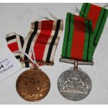 A 1939-45 DEFENCE MEDAL TOGETHER WITH A GEORGE VI FAITHFUL SERVICE IN THE SPECIAL CONSTABULARY