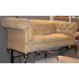 *A 19TH CENTURY MAHOGANY BUTTON DOWN CHESTERFIELD SOFA ON TAPERED CYLINDRICAL SUPPORTS WITH BROWN