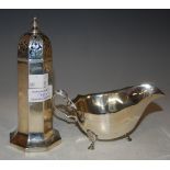 A LONDON SILVER OCTAGONAL SHAPED SUGAR CASTER TOGETHER WITH A SHEFFIELD SILVER SAUCE BOAT, 7.1