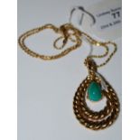 A YELLOW METAL CHAIN STAMPED 14KT SUSPENDING A YELLOW METAL AND TURQUOISE PENDANT, GROSS WEIGHT 17.5