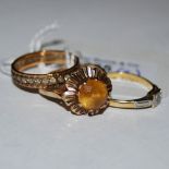 A 9CT GOLD DRESS RING SET WITH CITRINE COLOURED STONE, A 9CT GOLD ETERNITY RING SET WITH PASTE