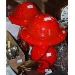 PAIR OF MONART STYLE GLASS TABLE LAMPS, EACH IN SCARLET COLOURED GLASS WITH DOMED SHADES AND BRASS